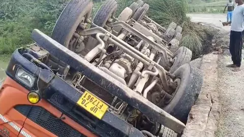 Dumper overturned in the canal, driver saved his life by jumping