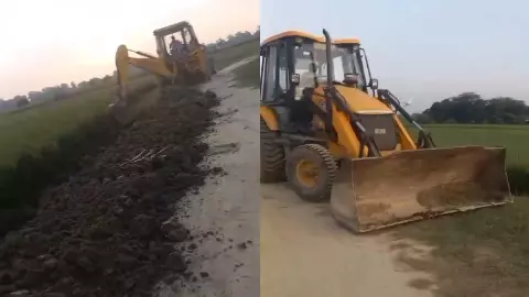 Etah News: प्रधान डलवा रहा था खेतों में जेसीबी से सड़क, एसडीएम ने रुकवा कर दिये जांच के आदेश