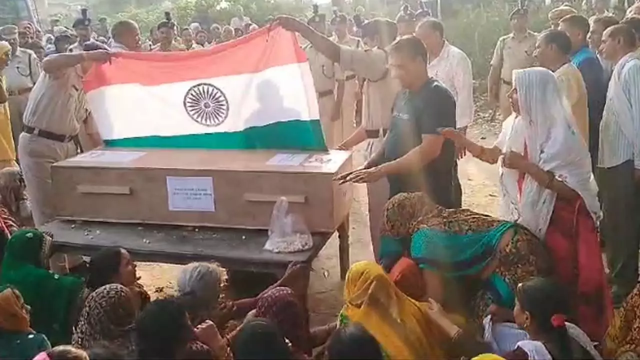 Crowd gathered for the last glimpse of the soldier, CRPF soldiers saluted