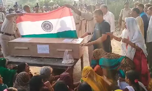 Crowd gathered for the last glimpse of the soldier, CRPF soldiers saluted
