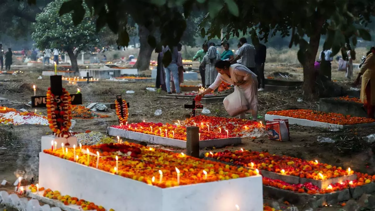 All Souls Day is celebrated for the ancestors Remember, people of Christian community prayed by lighting candles on the grave