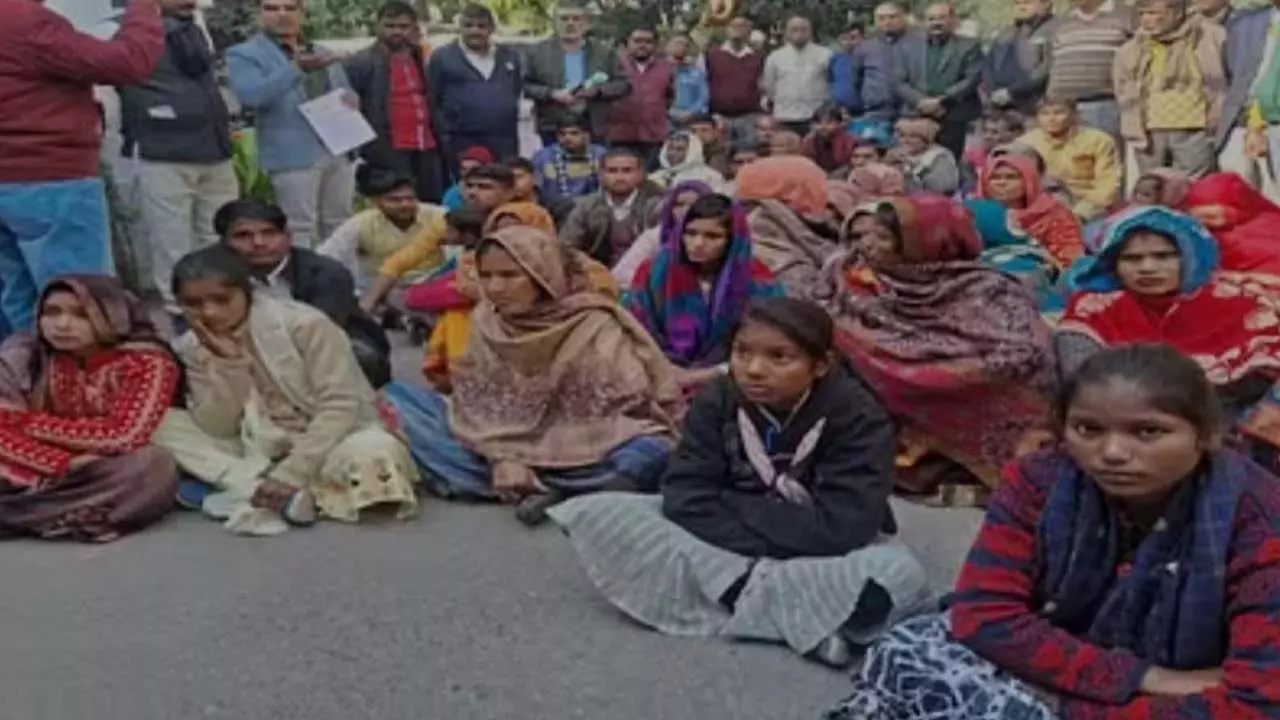 Families of youth killed in Gausganj scandal protest at collectorate with their demands