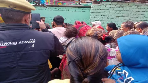 Police arrive with JCB to clear illegal construction