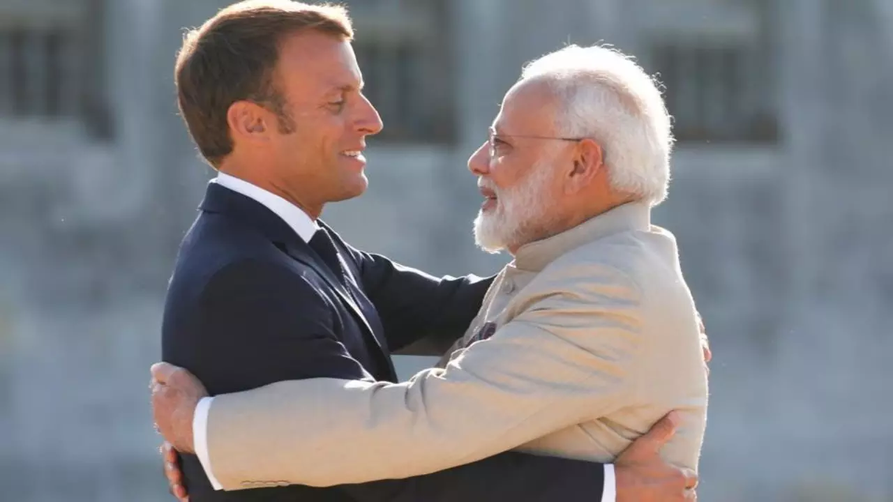 French President Emmanuel Macron welcomes Prime Minister Narendra Modi