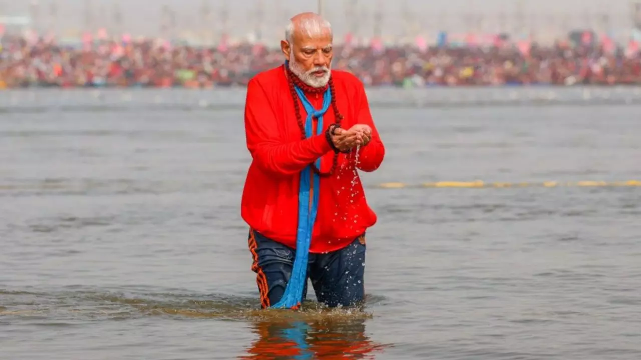 PM Modi Sangam holy dip