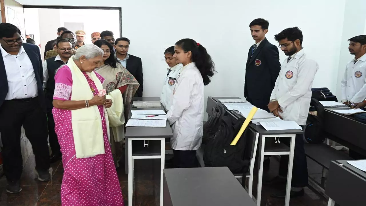 Governor Anandiben Patel distributes pre-school kits and health kits to 501 Anganwadi centers