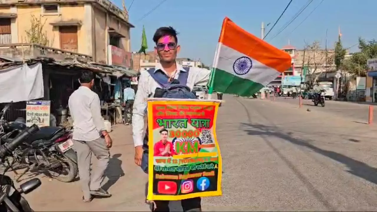 A youth walks on Char Dham Yatra