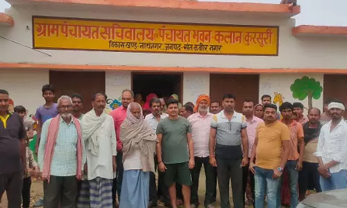 Employment servant and village chief accusing each other of corruption