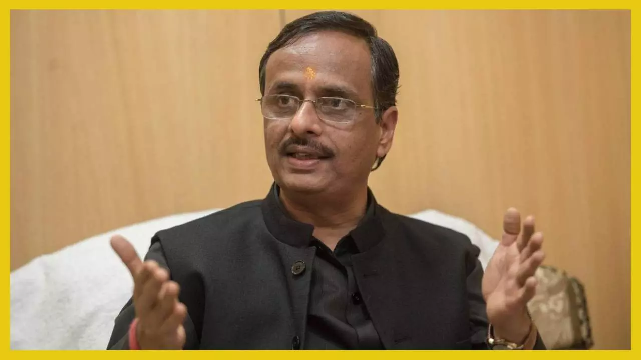 Dr Dinesh Sharma