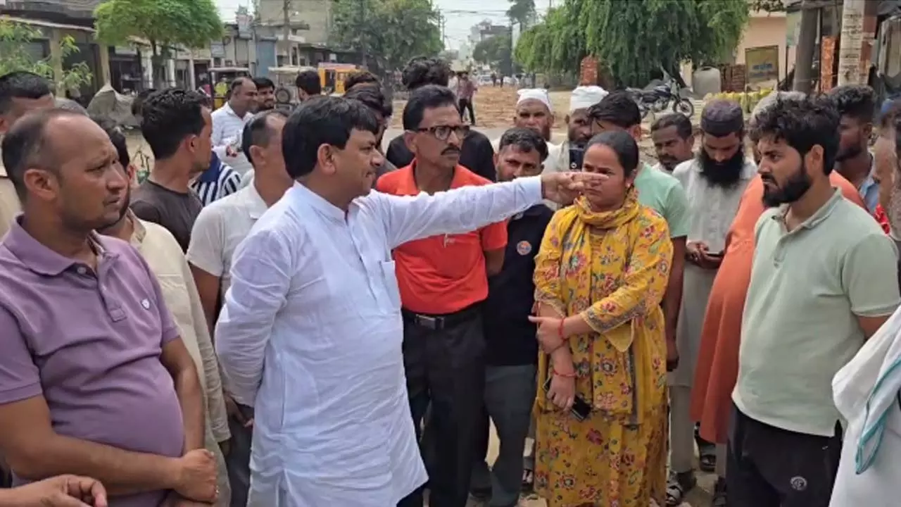 Minister Kapil Dev Agarwal excavates road construction materials, checks, catches corruption