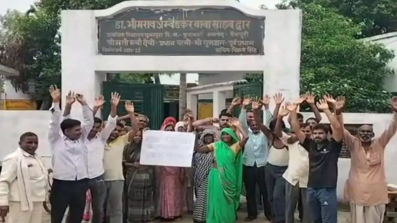 Villagers protest against school merger decision