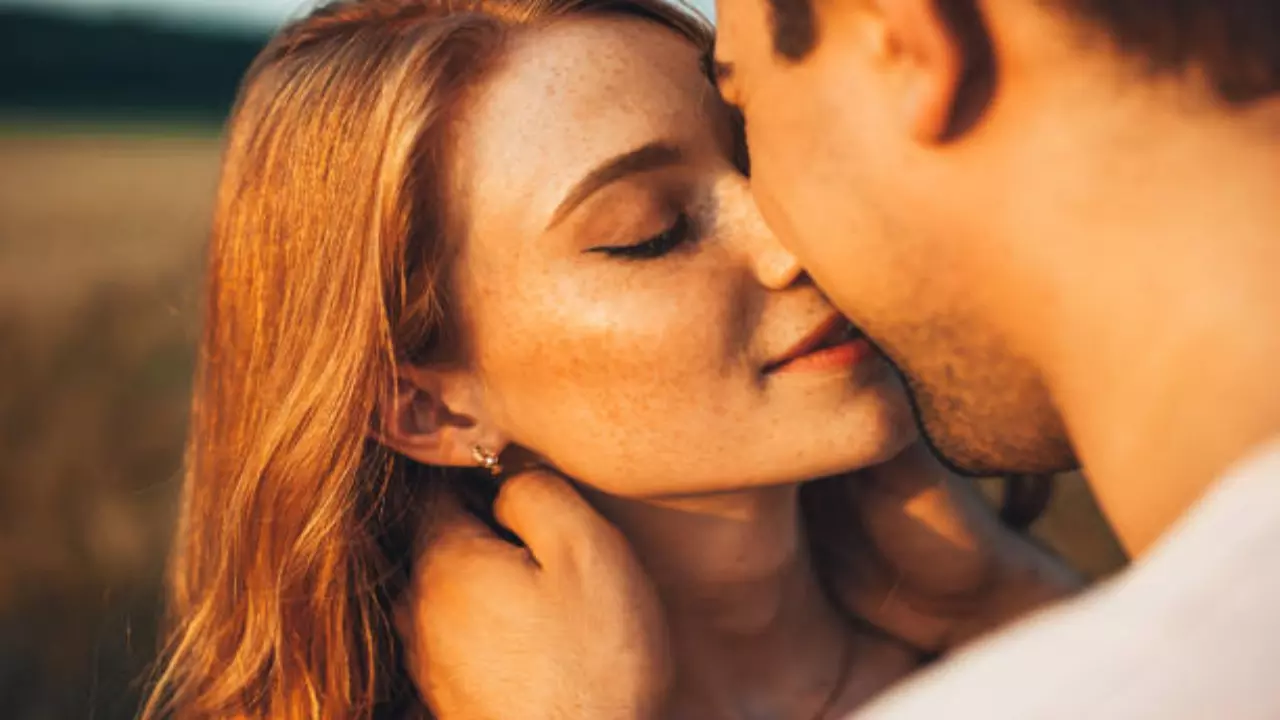Why eyes close while kissing