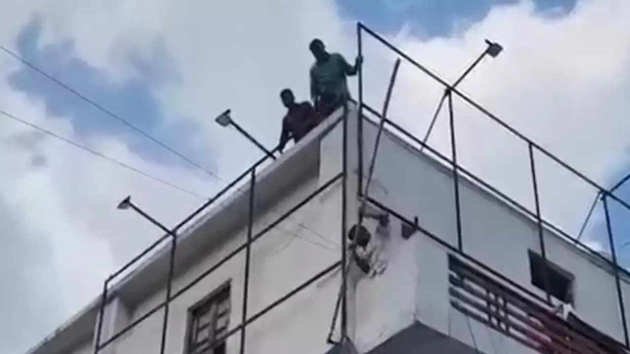 Corporation team removing illegal hoardings