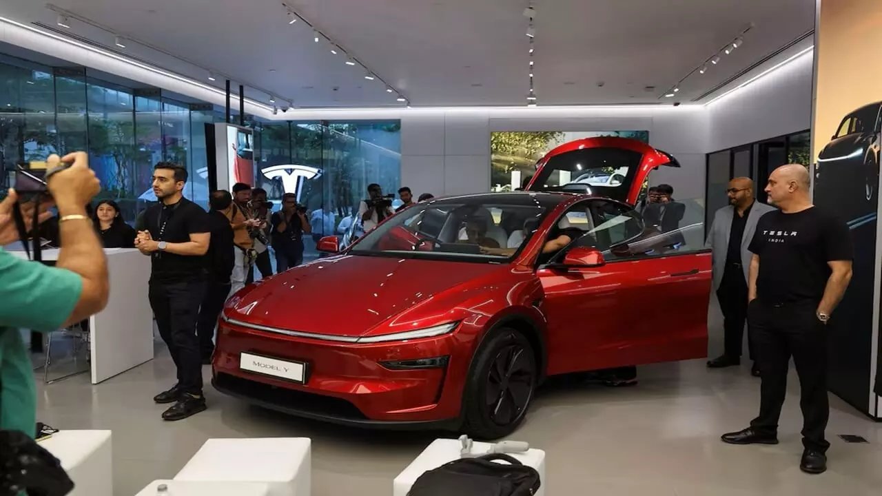 Tesla Model Y launch Delivery
