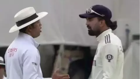 KL Rahul and Dharmsena KL Rahul and Dharmsena