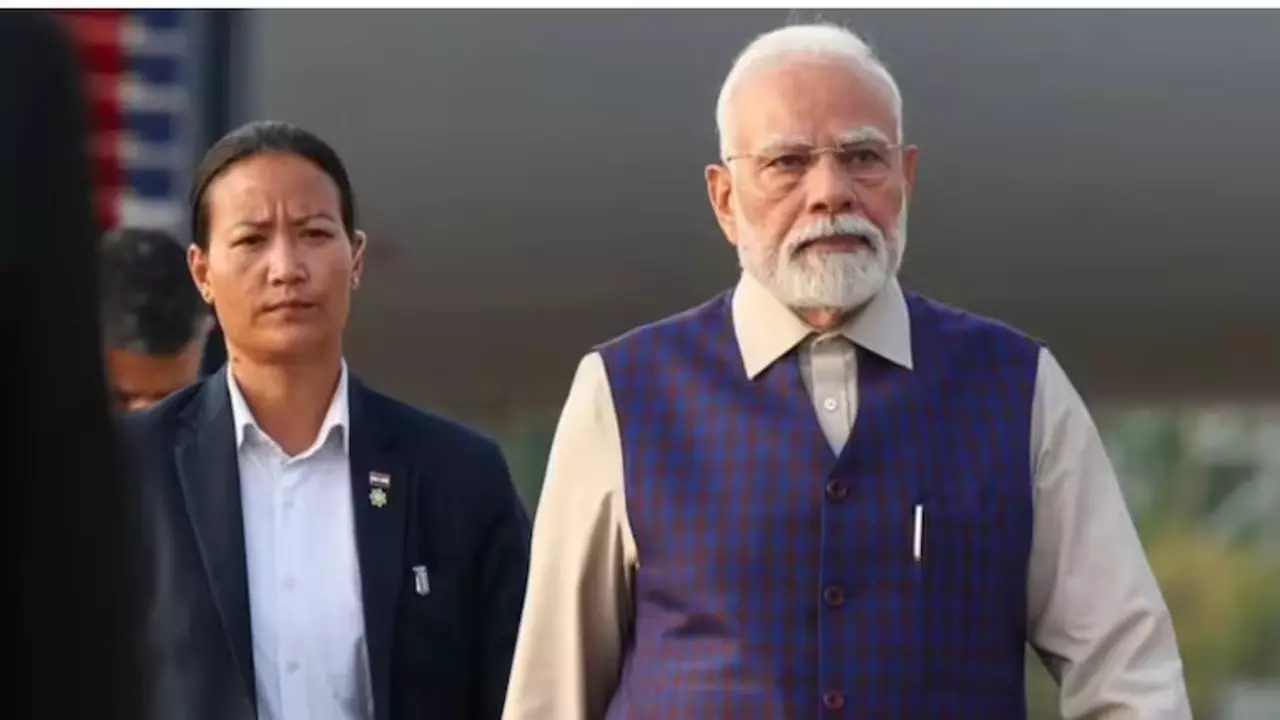 Inspector Adaso Kapesa with PM Modi