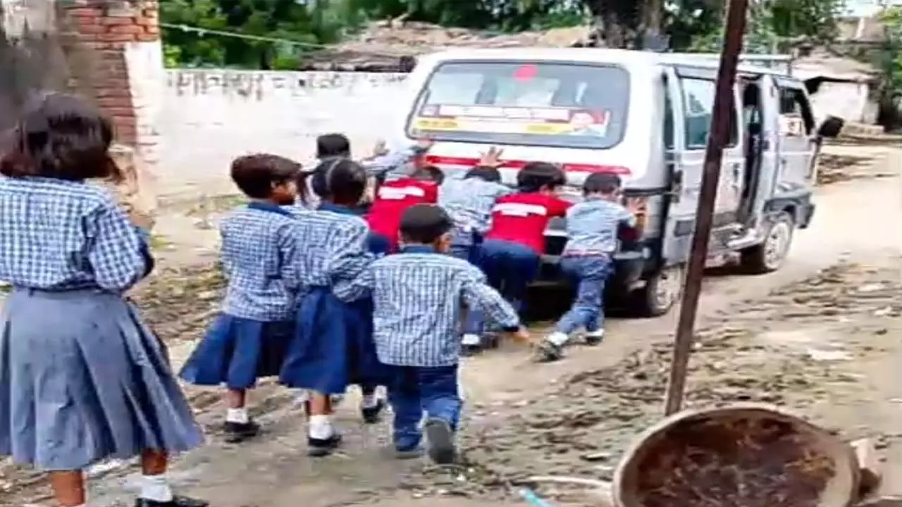 Video of children pushing school van viral, parents angry