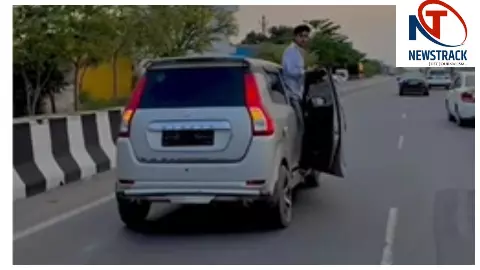 हापुड़ में चलती कार की खिड़की पर खड़ा युवक, वायरल वीडियो के बाद 36,000 का चालान हापुड़ में चलती कार की खिड़की पर खड़ा युवक, वायरल वीडियो के बाद 36,000 का चालान