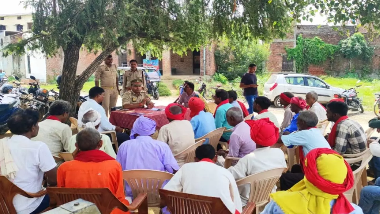Police meeting with watchmen on drones and theft rumors, instructing them to be vigilant