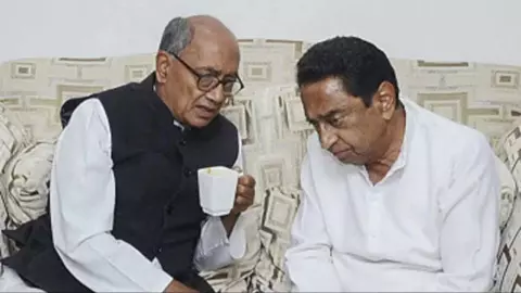 PM मोदी की तस्वीर शेयर कर बुरे फंसे दिग्विजय सिंह, कांग्रेस में छिड़ा गृहयुद्ध, पार्टी में सबसे बड़े बदलाव की तैयारी PM मोदी की तस्वीर शेयर कर बुरे फंसे दिग्विजय सिंह, कांग्रेस में छिड़ा गृहयुद्ध, पार्टी में सबसे बड़े बदलाव की तैयारी