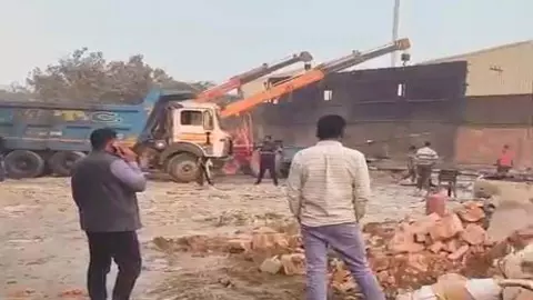 Illegal occupation removed from UPSIDC land, vigorously hacked by administration Illegal occupation removed from UPSIDC land, vigorously hacked by administration