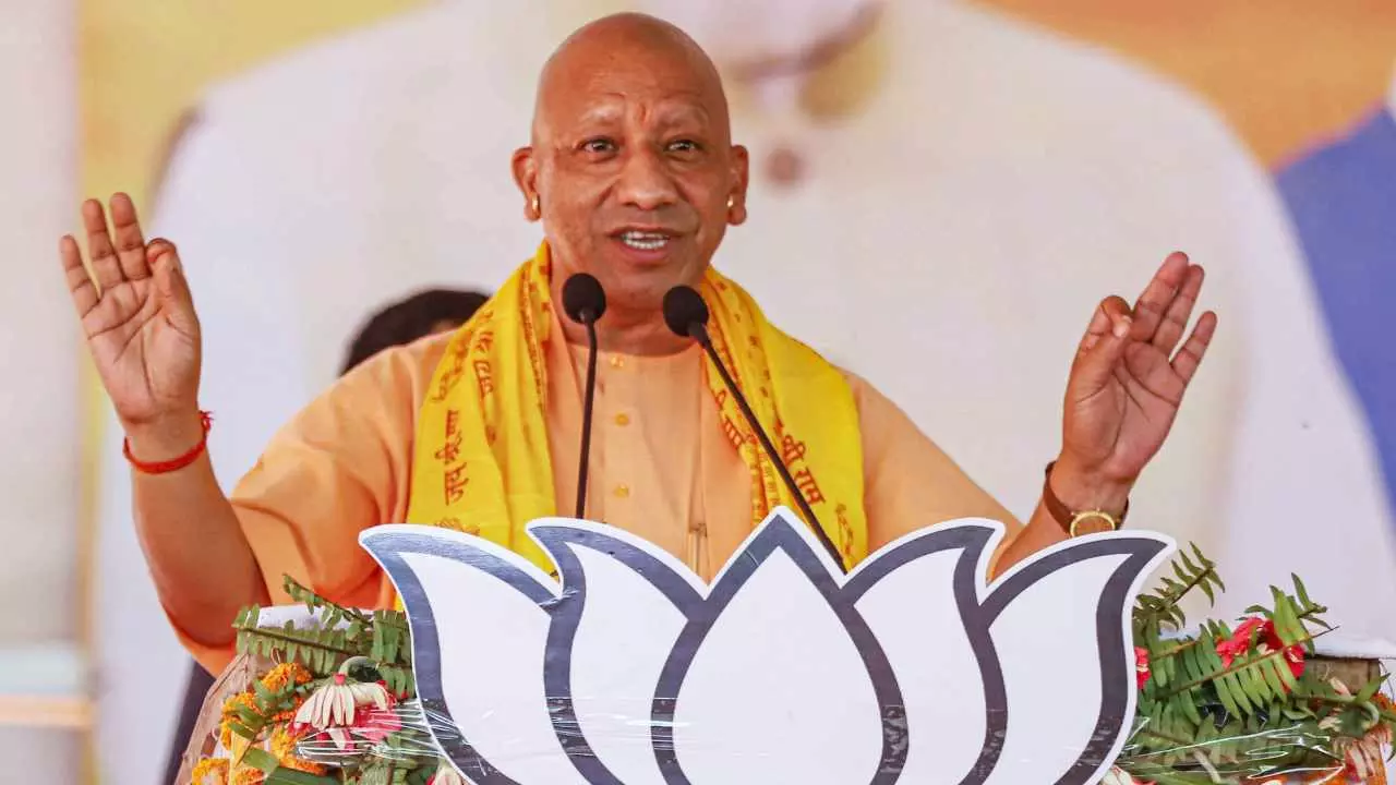 Yogi Adityanath Hoists BJP Flag at Gorakhnath Temple on Foundation Day ...