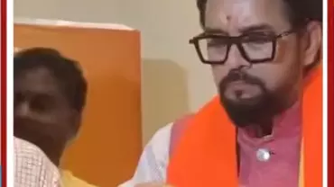 भगवा गमछा-तिलक में अनुराग ठाकुर ने खाई मछली! वायरल वीडियो ने सोशल मीडिया पर मचाया बवाल