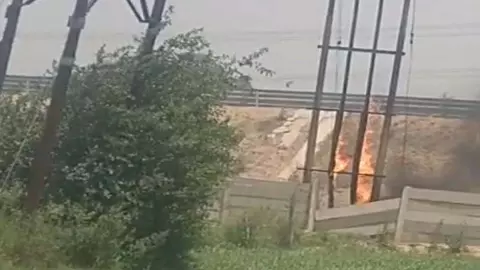 fire at high tension pole, power outages in several areas