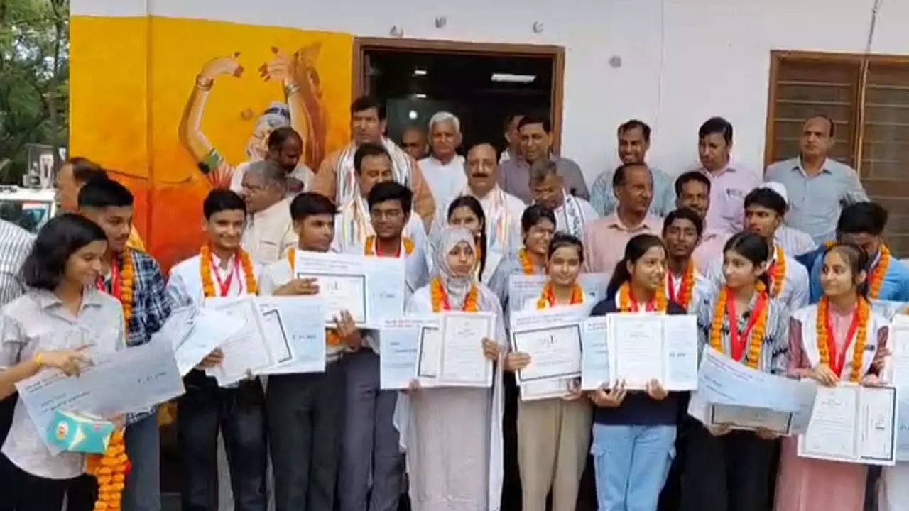 Meritorious students honored, toppers receive cheques, medals and citations