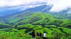 Kudremukh National Park Karnataka with waterfalls and lush green hills monsoon trip 2026