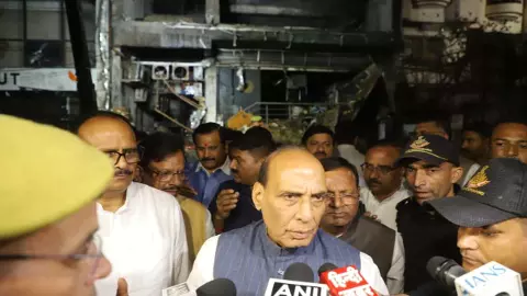 rajnath singh at site of lucknow fire
