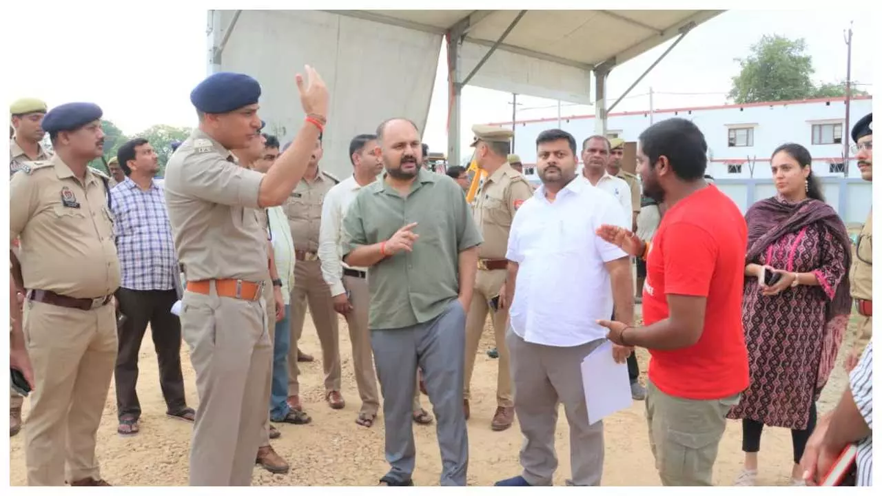 DM and SP inspect the venue during the proposed visit of the Chief Minister DM and SP inspect the venue during the proposed visit of the Chief Minister