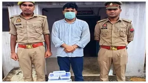 Aligarh News: फर्जी PAN कार्ड से लाखों की ज्वेलरी खरीदने वाला साइबर ठग गिरफ्तार, तनिष्क बना निशाना