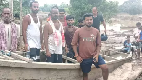 Assam Flood Hero: Shravan Kumar Saves Over 2,000 Lives Despite Losing His Own Home Assam Flood Hero: Shravan Kumar Saves Over 2,000 Lives Despite Losing His Own Home