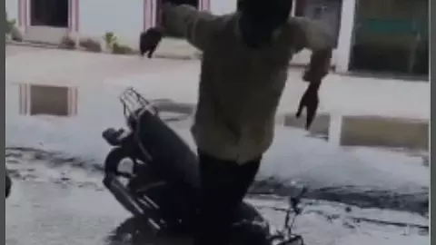 police bike in drain in Rae Bareli collectorate