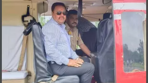 DM Sanjay Chauhan showers flowers from helicopter at Dandeshwar Mahadevs court DM Sanjay Chauhan showers flowers from helicopter at Dandeshwar Mahadevs court