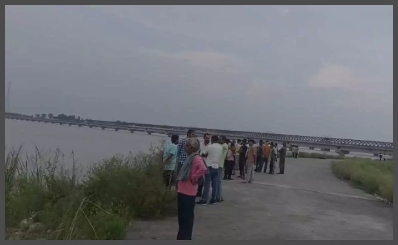 Woman traveling by bike with husband jumps into Ganga, search continues