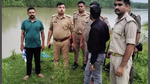 Youth drowns in river, divers search continues