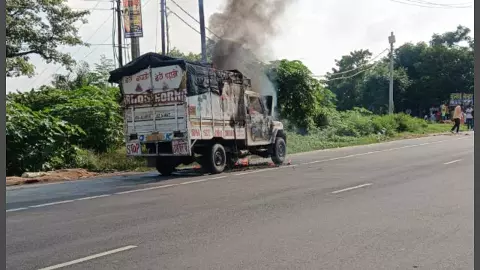 Moving pickup catches fire