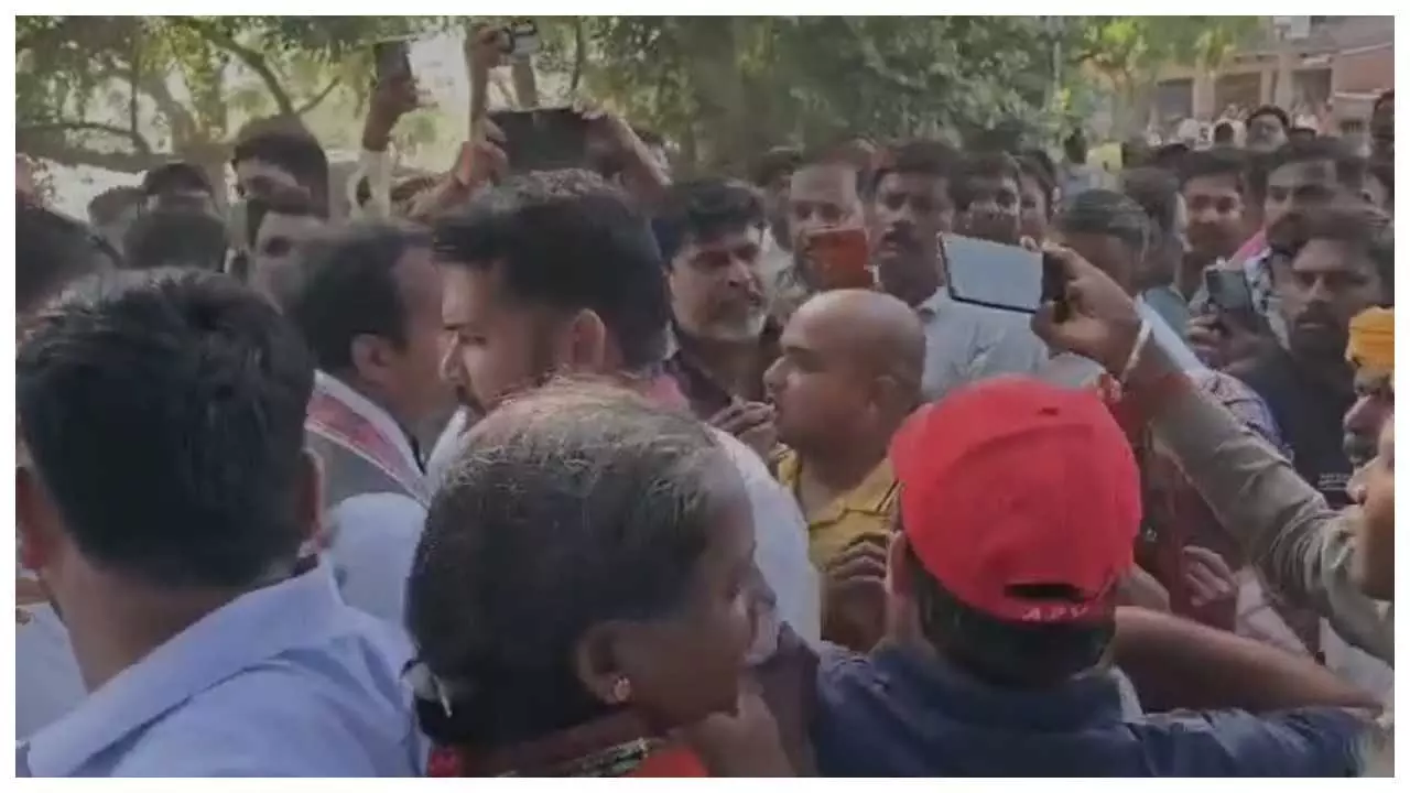 Samajwadi Party leader arrives to meet Dalit victims family, villagers protest against child violence Samajwadi Party leader arrives to meet Dalit victims family, villagers protest against child violence