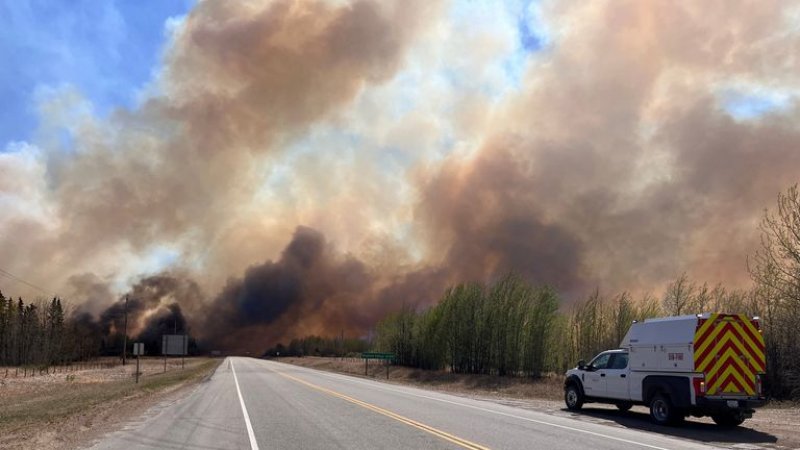 Wildfires ravage Canadas Alberta, over 30,000 forced to evacuate