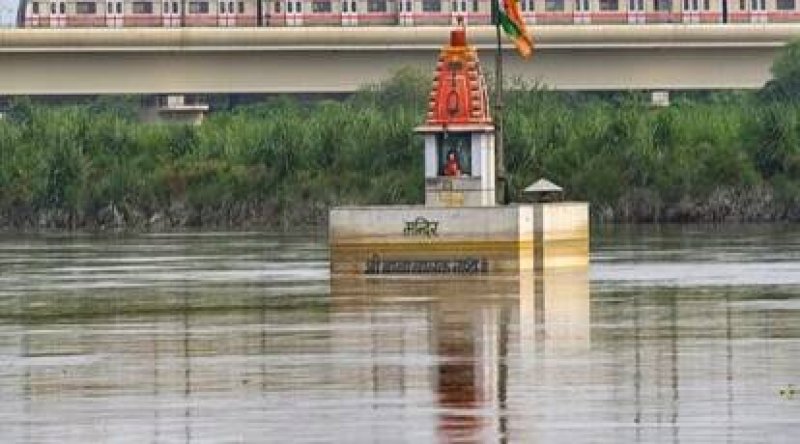 Yamuna River inches towards danger mark at Delhis Old Railway bridge as water level rises